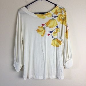 Deletta top ivory with front floral print.